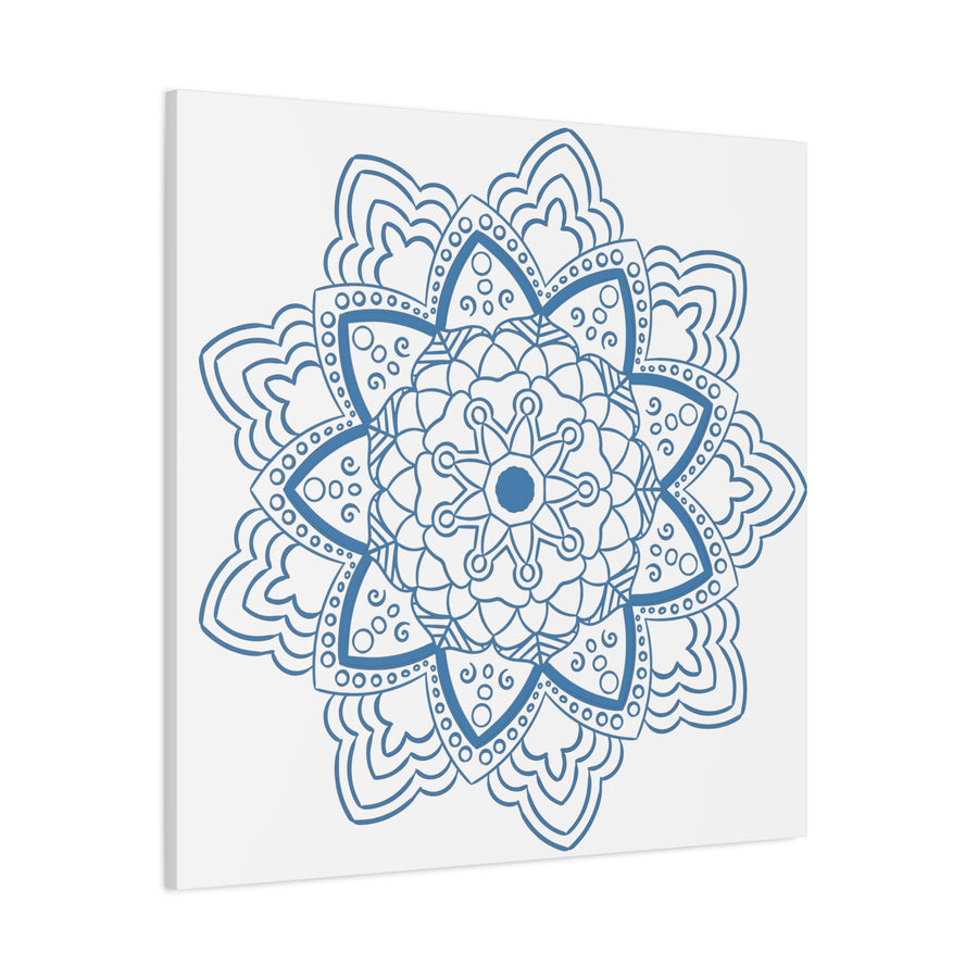 Handmade Mandala Art featuring a beautiful steel blue design on matte canvas, stretched to 125 inches, perfect for adding a touch of elegance to any wall decor