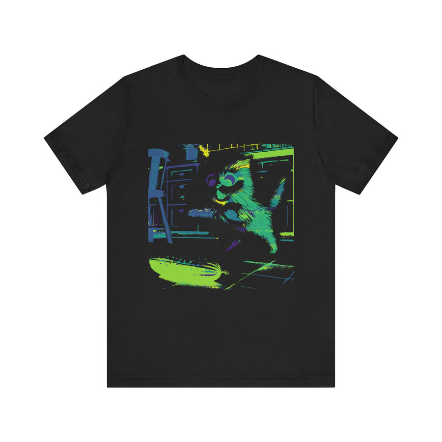 A black cat with a startled expression jumping away from a neon cucumber silhouette on a t-shirt