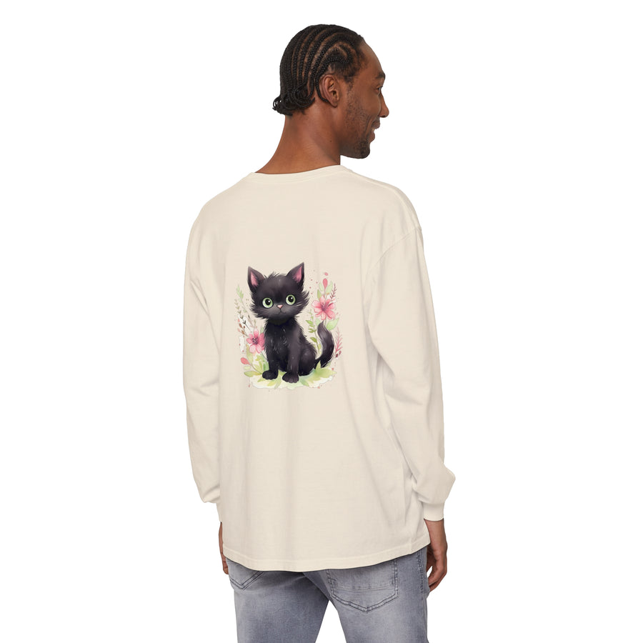 Adorable white kitten playing with colorful floral watercolor on t-shirt