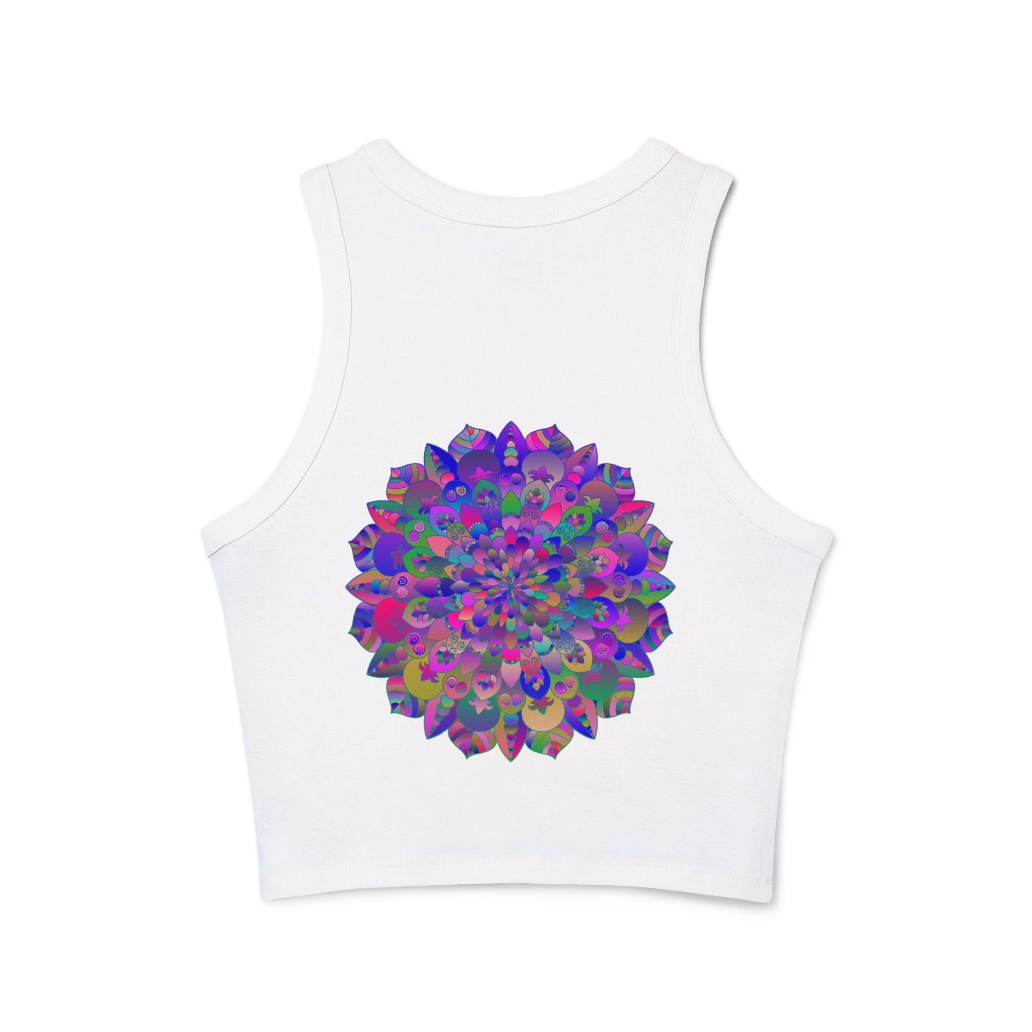 Woman wearing the Vibrant Mandala Racerback Tank Top during a beachside sunset yoga session