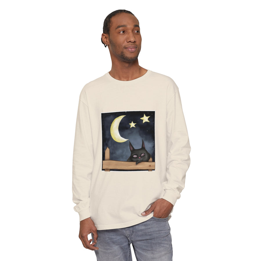 A black t-shirt with a sleepy cat gazing at the night sky design
