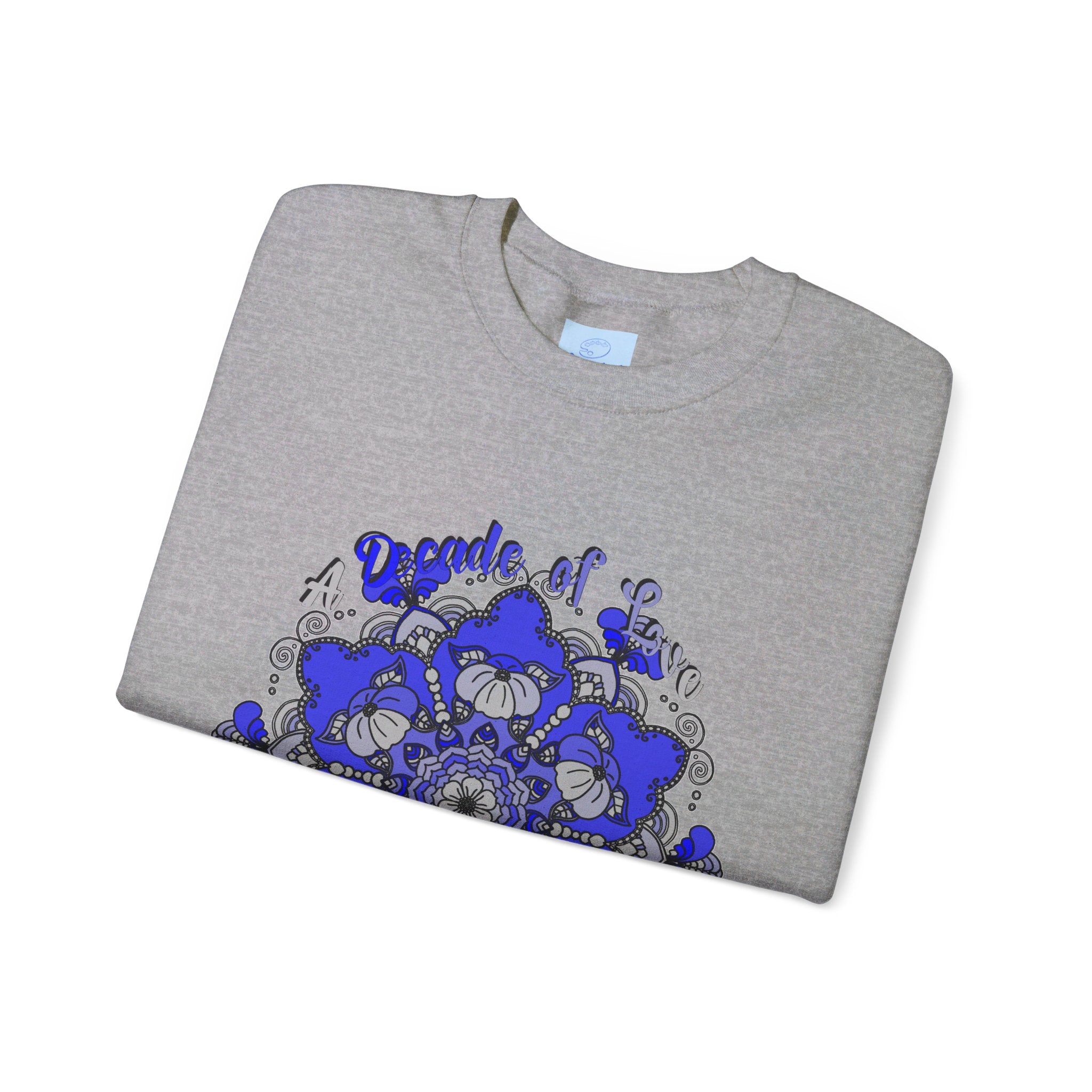 10th Anniversary Mandala Design Unisex Sweatshirt displayed on a model, showcasing its stylish and versatile look