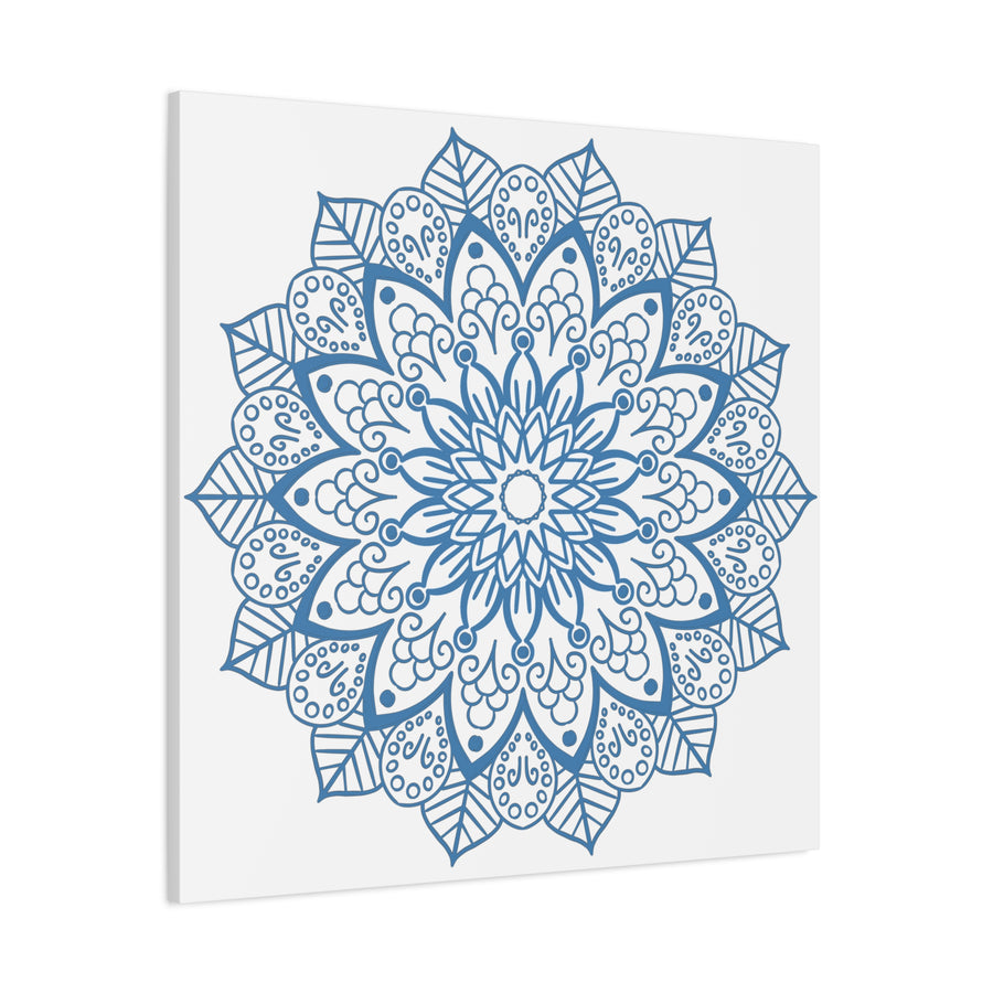 Beautiful handmade mandala wall art featuring a steel blue design on matte canvas, stretched and 125 inches thick