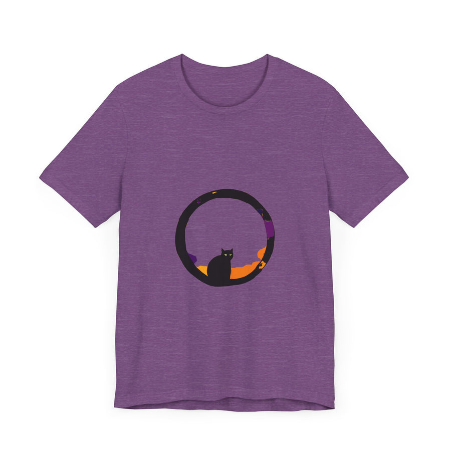 A black cat with glowing green eyes stands in front of a full moon, wearing a mysterious and stylish t-shirt with a spooky design
