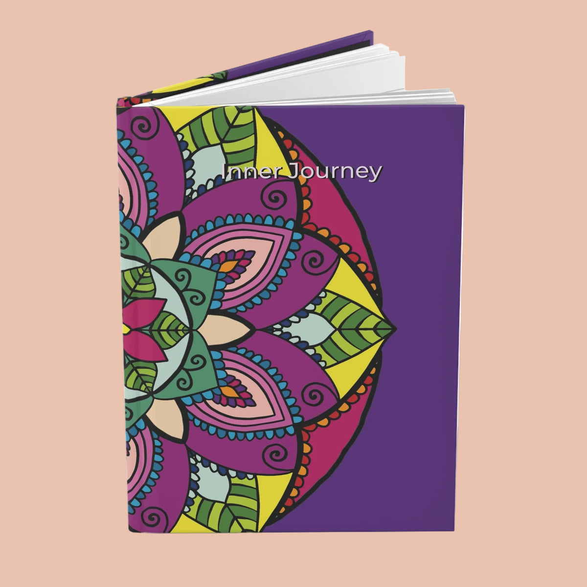 Notebook with a colorful mandala design on a purple background