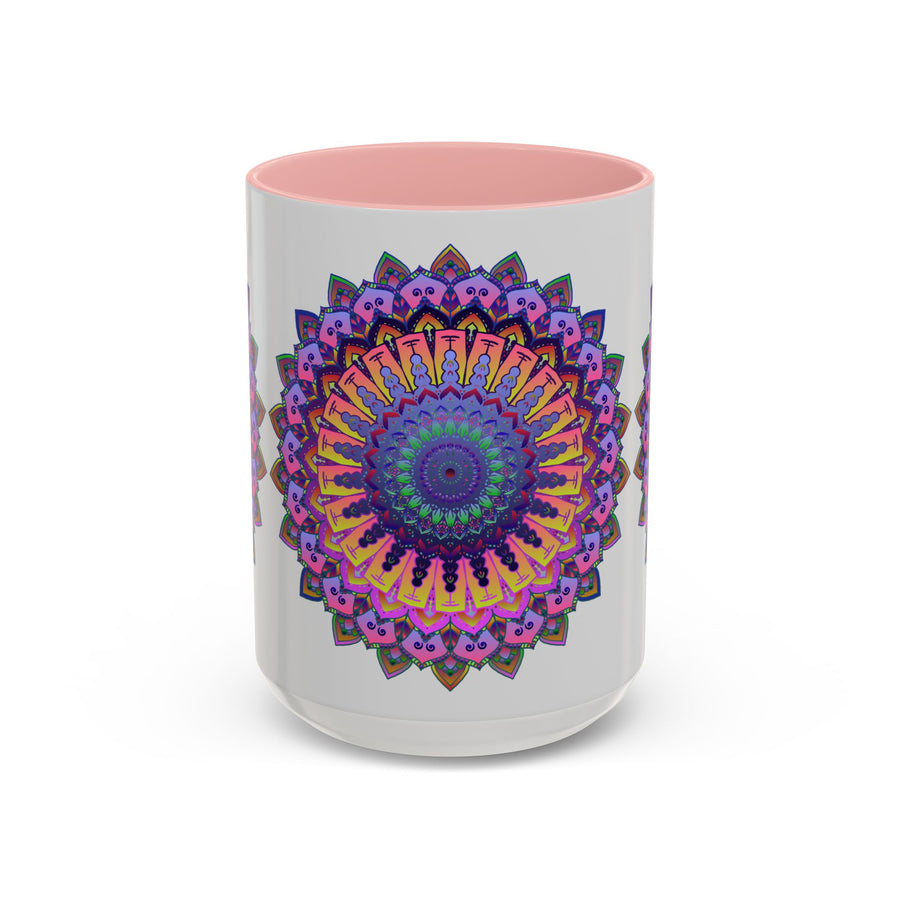 A close-up photo of a grey mug with a vibrant mandala design