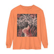 Graphic t-shirt featuring a playful ginger cat lounging under a tropical palm tree