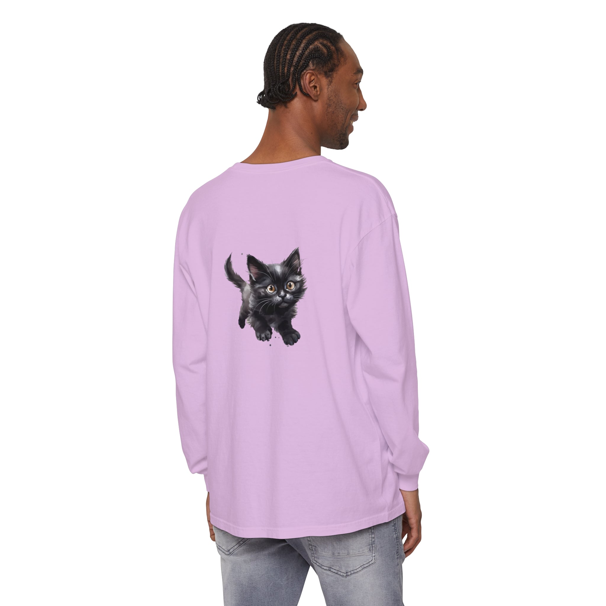 A watercolor illustration of a playful kitten on a t-shirt