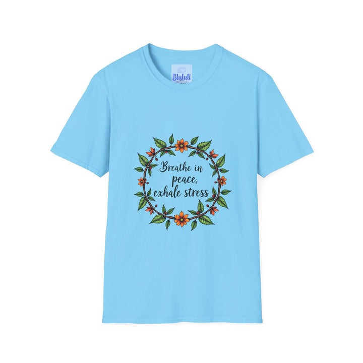 Beautiful white t-shirt with a floral garland design and the phrase 'Breathe in Peace Exhale Stress' printed in delicate script, perfect for adding a touch of tranquility to your wardrobe