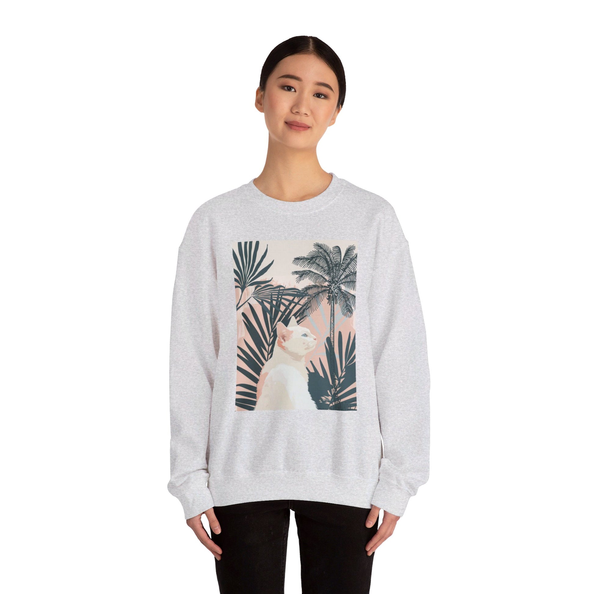 Cozy unisex heavy blend crewneck sweatshirt with a cute cat under palm trees design