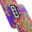 A close-up image of a hand drawn purple mandala art phone case