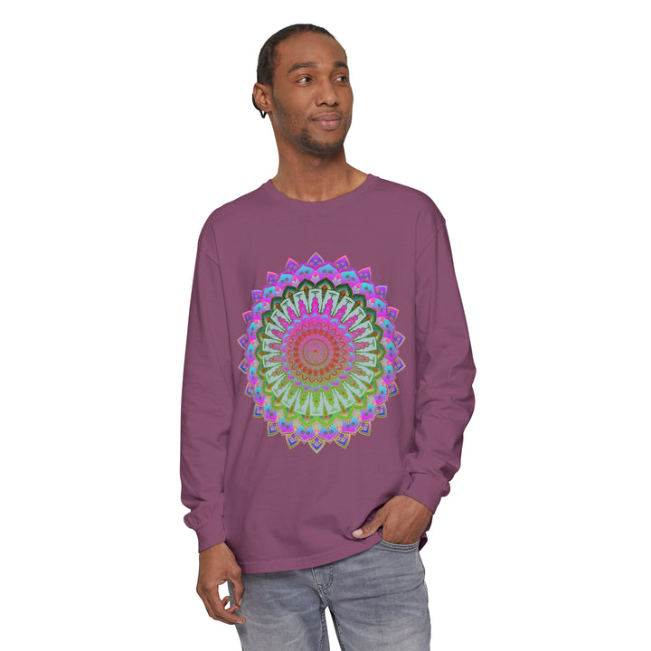 Colorful and intricate mandala design printed on a unisex long sleeve t-shirt