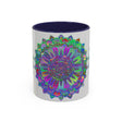 Colorful mandala art mug with intricate design in vibrant reds and blues