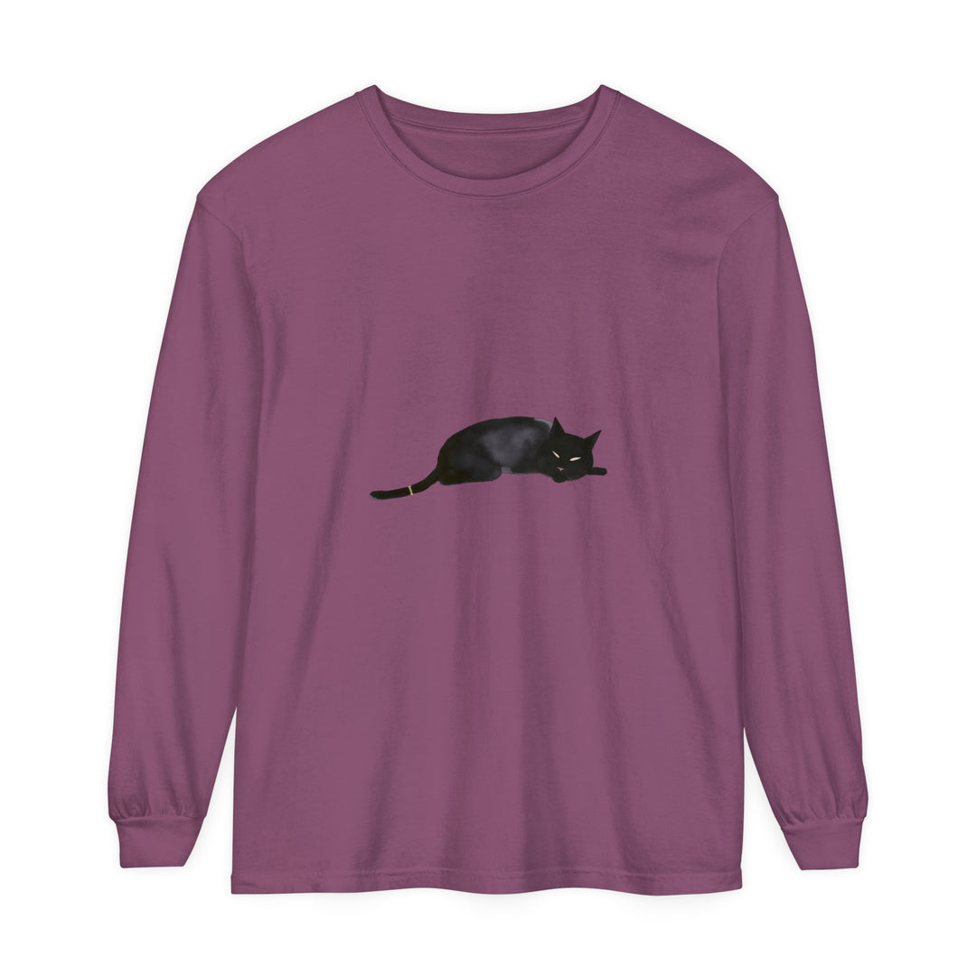 A cozy, long-sleeve unisex black t-shirt featuring an adorable sleeping cat design