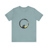 A black cat with a mischievous expression sits under a crescent moon on a whimsical style tee shirt