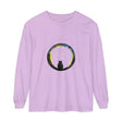 A black cat silhouette sitting against a crescent moon on a Halloween-themed t-shirt