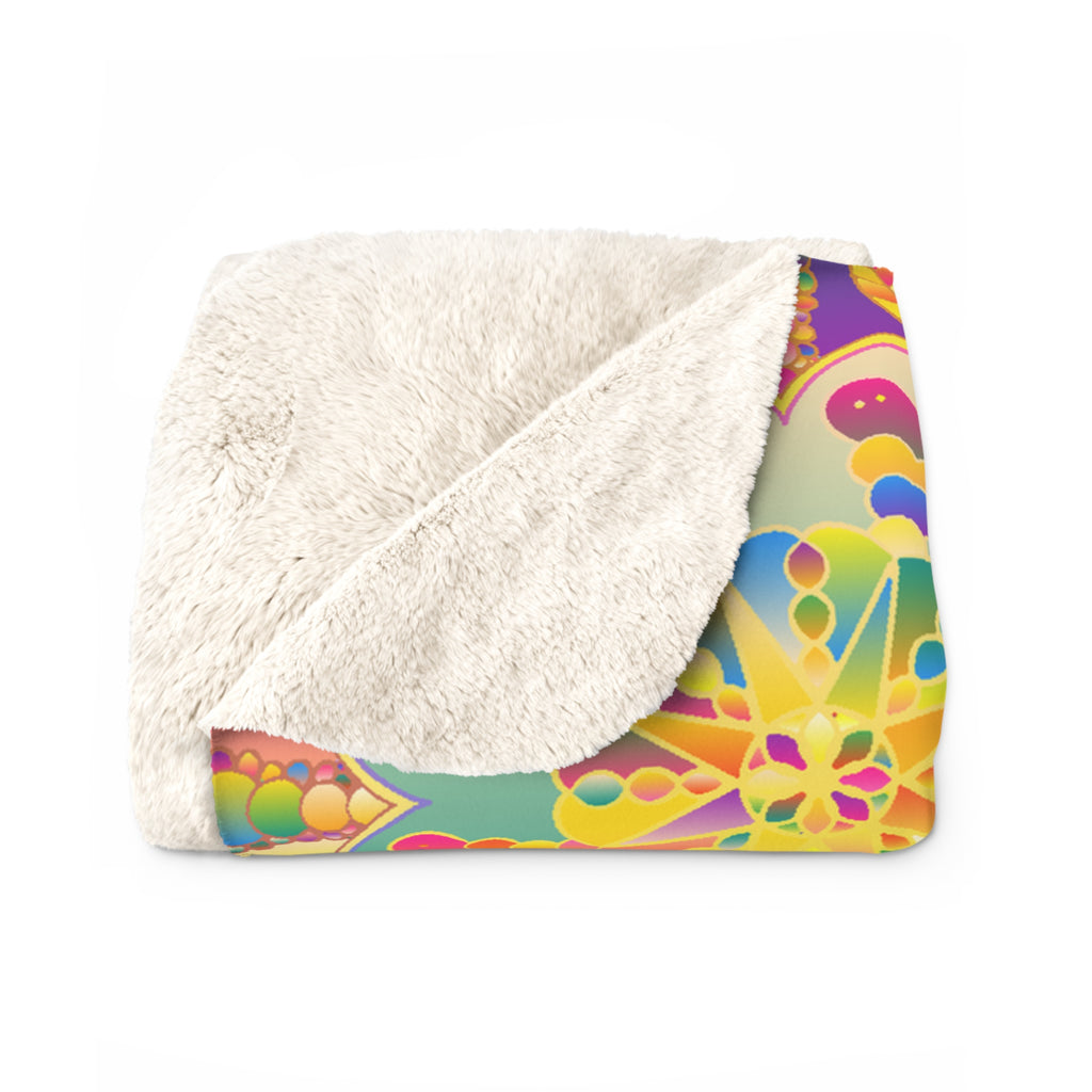 Colorful blanket with a geometric pattern on a white background