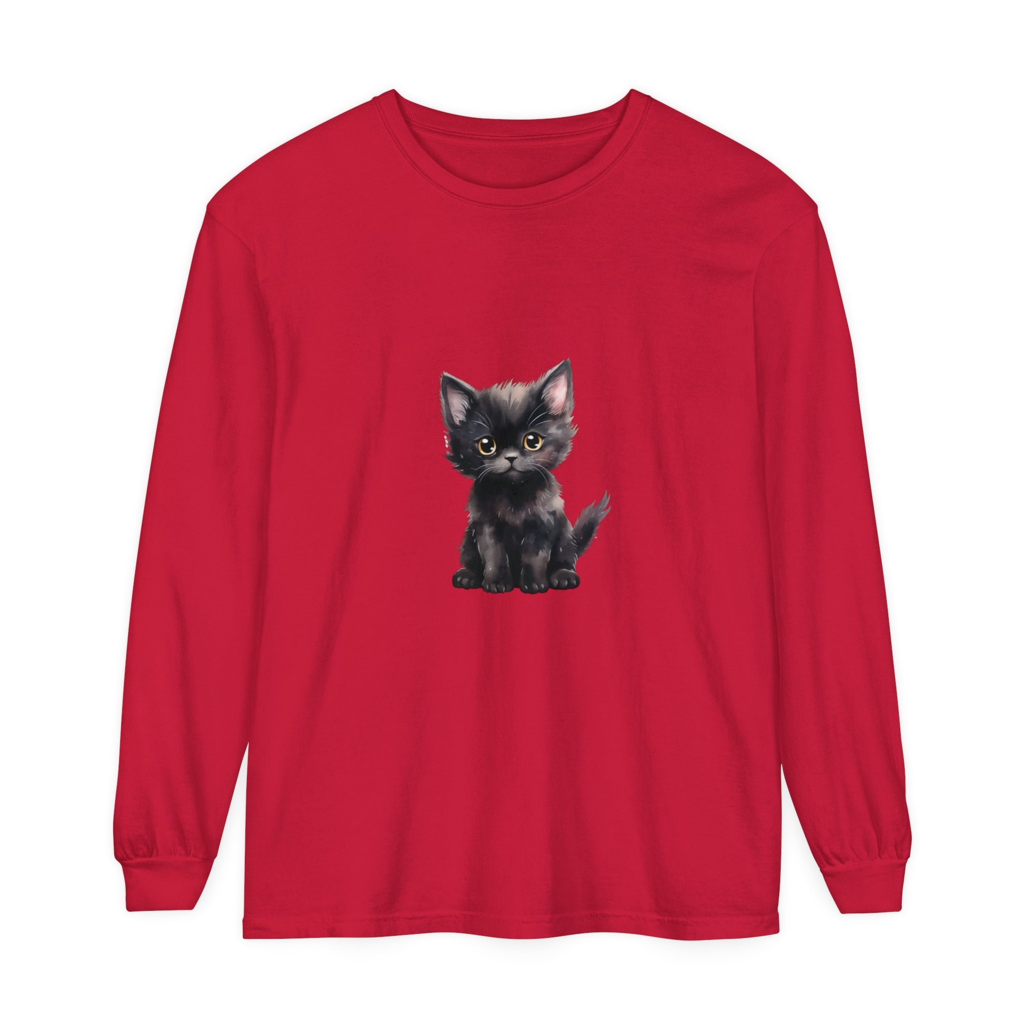Adorable black kitten with striking yellow eyes on a comfortable long sleeve t-shirt