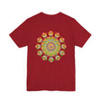 Man wearing Mandala Peace & Harmony T-Shirt in a peaceful garden