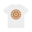 A beautiful mandala-inspired tee featuring intricate spiritual symbols for peace and harmony