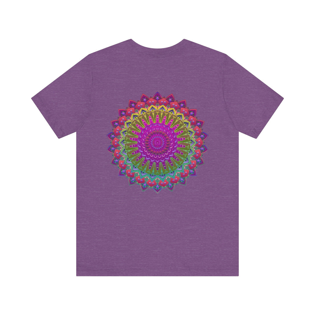 A close-up image of a colorful, intricate mandala tee with spiritual motifs, promoting peace and harmony