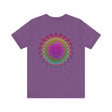 A close-up image of a colorful, intricate mandala tee with spiritual motifs, promoting peace and harmony