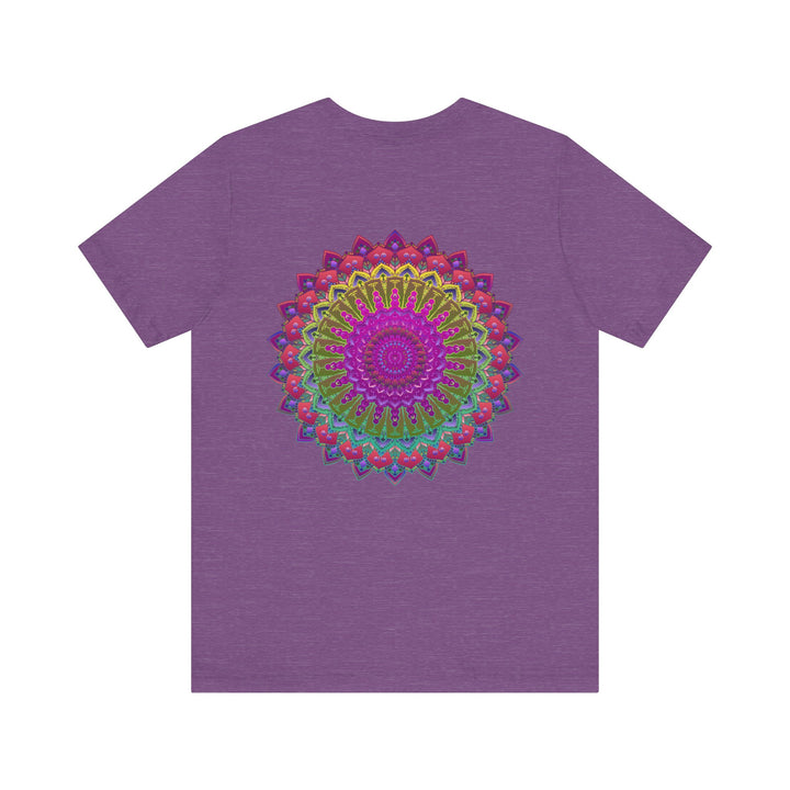 A close-up image of a colorful, intricate mandala tee with spiritual motifs, promoting peace and harmony