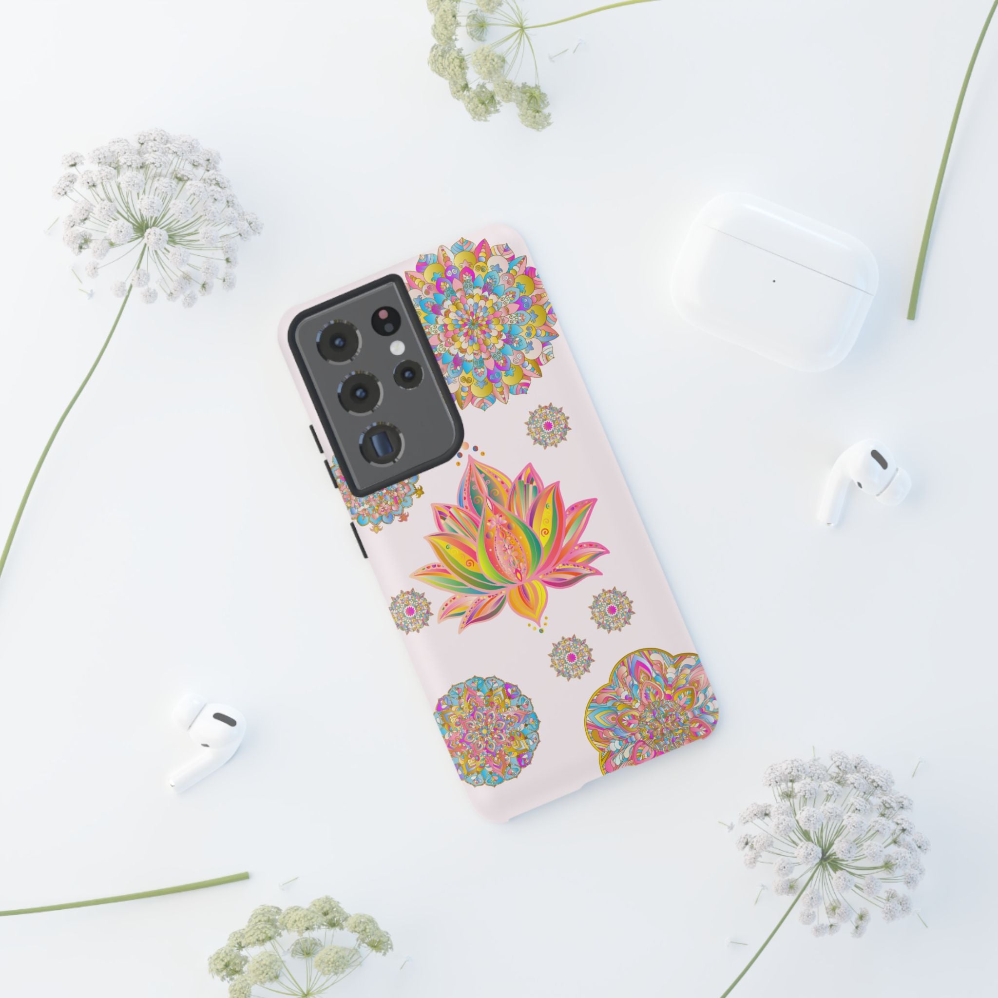 A beautiful light pink mandala design phone case featuring a lotus flower