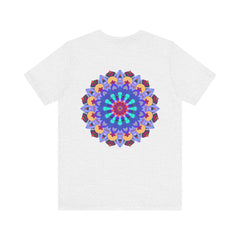 A vibrant and colorful t-shirt featuring a beautiful mandala design that promotes peace and harmony through spiritual art