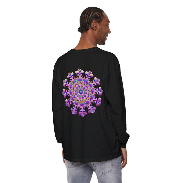 A vibrant and intricate mandala design adorns this unisex long sleeve t-shirt