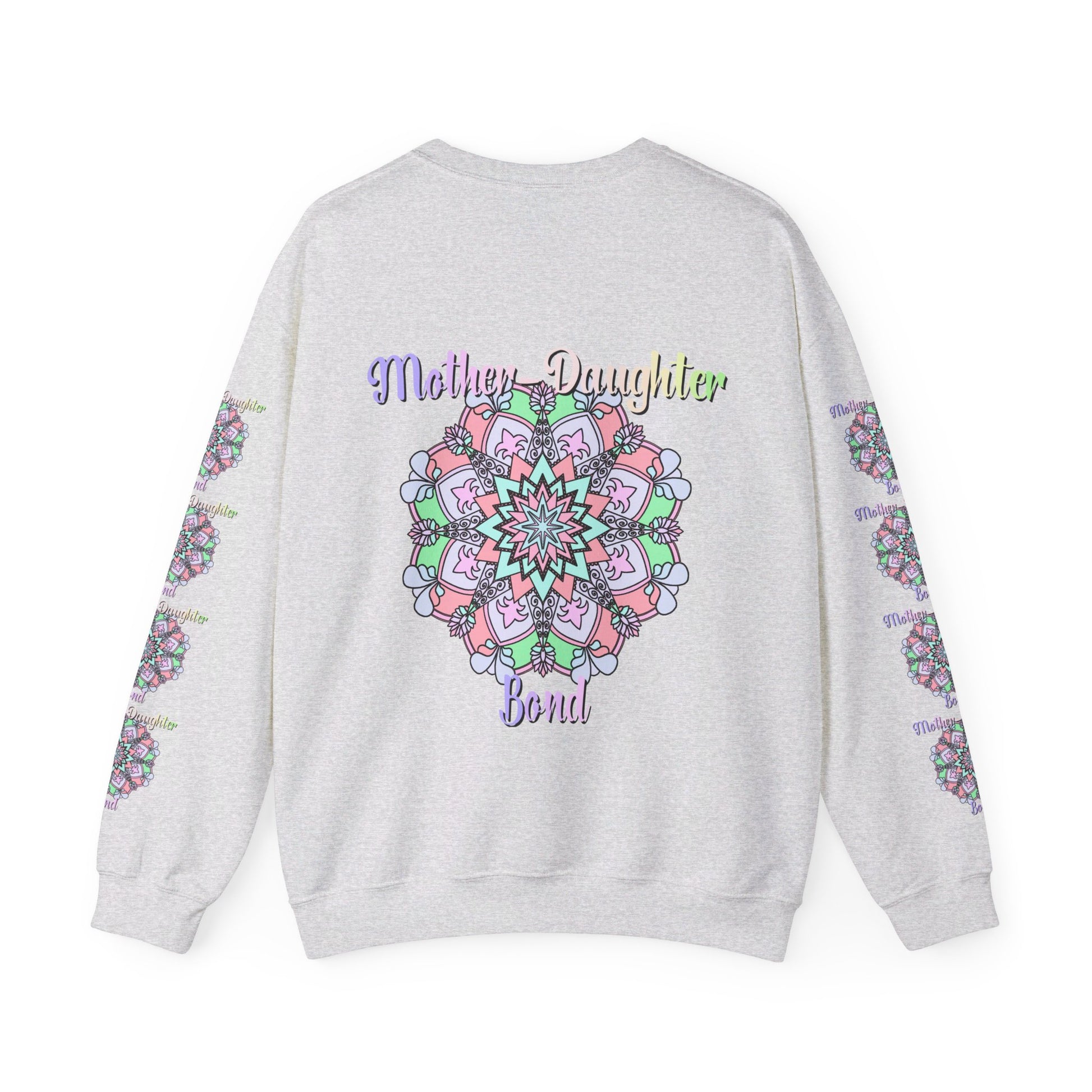 Mother and daughter embracing and smiling while wearing matching 'Mother-Daughter Bond' Unisex Heavy Blend™ Crewneck Sweatshirts, perfect birthday gift for Mom