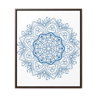 A beautiful handmade steel blue mandala design wall art on gallery canvas wraps in a vertical frame