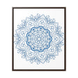 A beautiful handmade steel blue mandala design wall art on gallery canvas wraps in a vertical frame