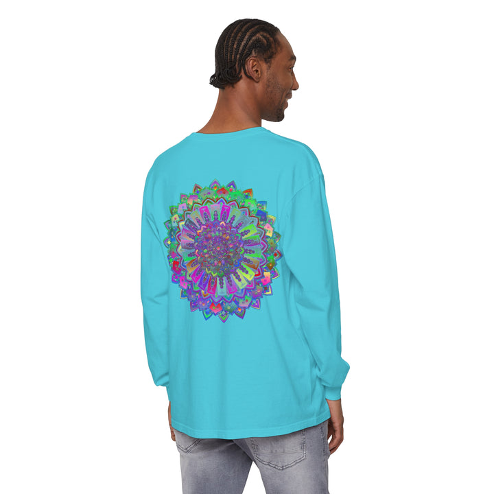 Colorful and intricate mandala design in shades of blue, green, and purple on a long sleeve t-shirt