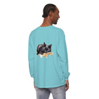 A watercolor illustration of a black cat peacefully sleeping on a t-shirt