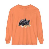 A beautiful watercolor illustration of a black cat sleeping on a t-shirt