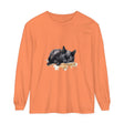 A beautiful watercolor illustration of a black cat sleeping on a t-shirt