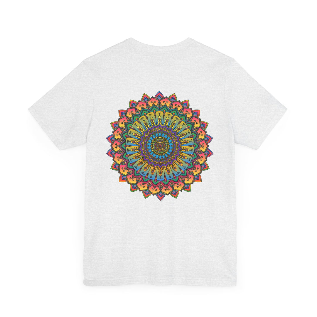 A close-up image of a vibrant mandala tee featuring intricate patterns and colors, representing spiritual peace and harmony