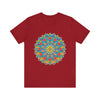 A close-up image of a vibrant mandala tee with an intricate and colorful design