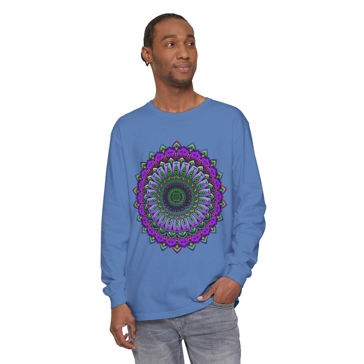 A close-up photo of a colorful, intricate mandala design on a unisex long sleeve t-shirt