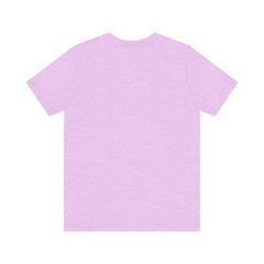 A vibrant purple t-shirt featuring a whimsical design of a mysterious cat