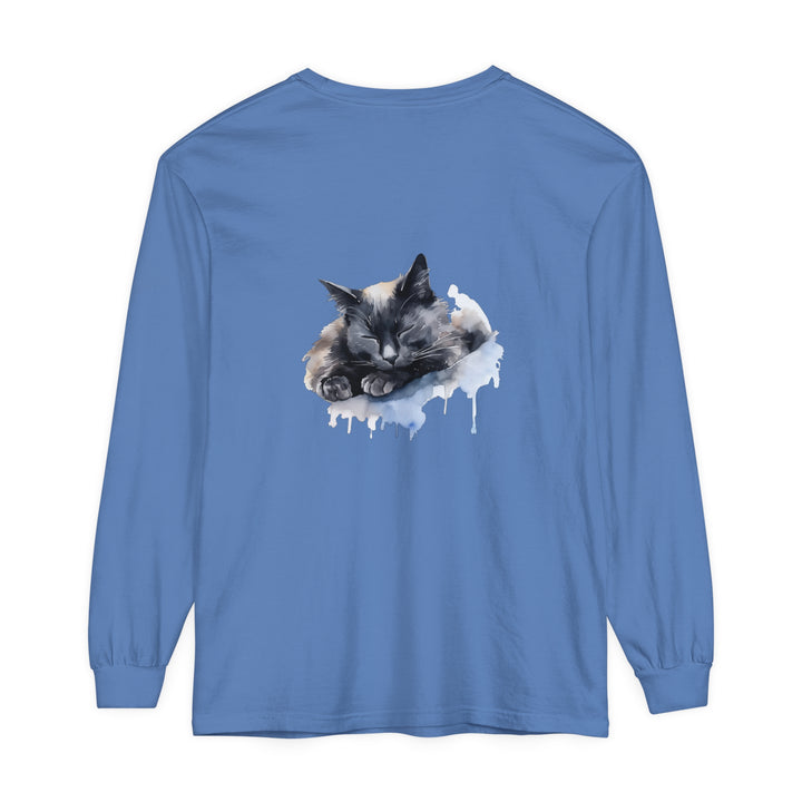 A watercolor illustration of a peaceful gray and white cat sleeping on a t-shirt