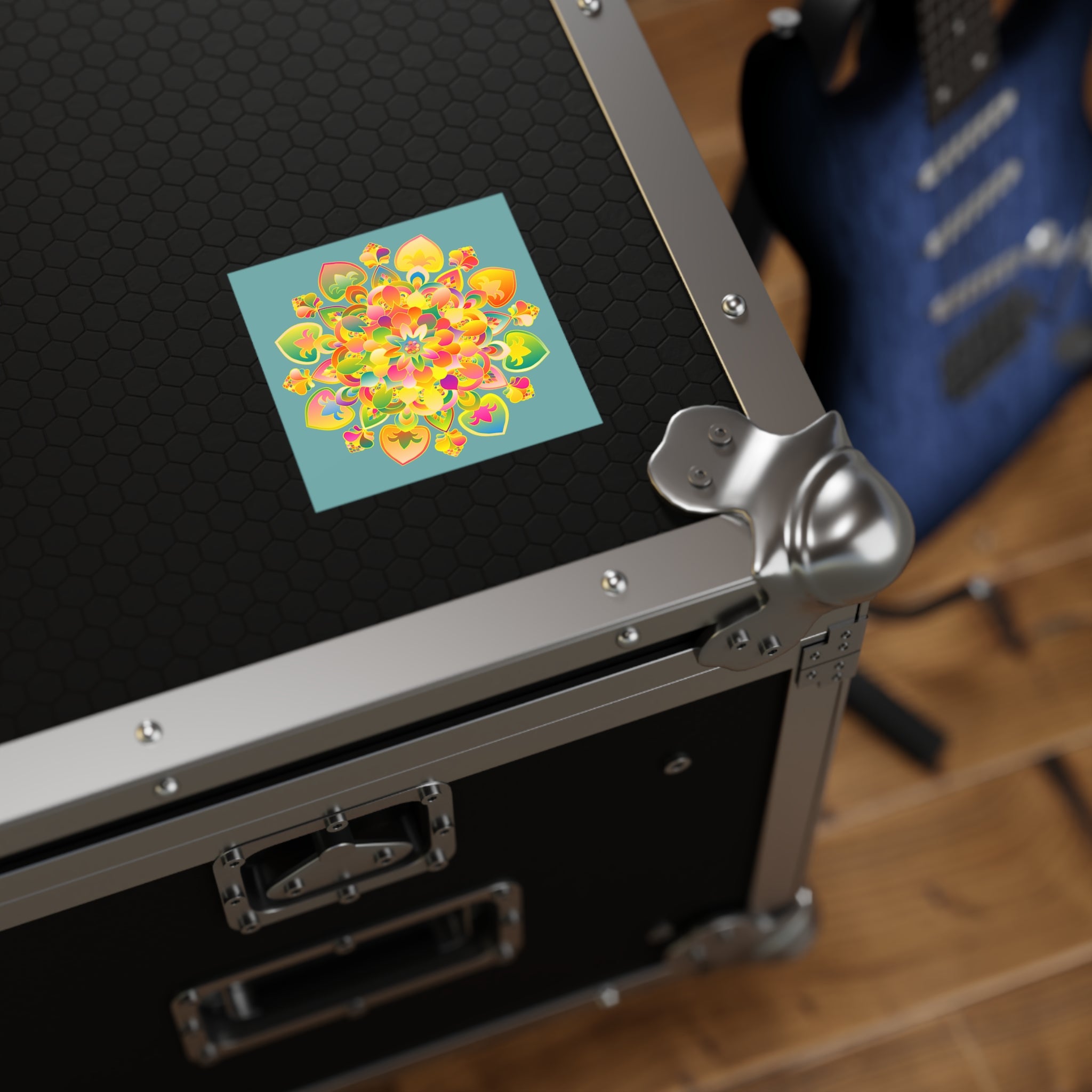 Adesivi laminati mandala disegnati a mano: oro, rosso e verde su verde acqua grigiastro