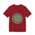 A vibrant and colorful tie-dye t-shirt featuring a psychedelic mandala design