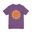 A colorful and intricate mandala design adorns this vibrant tee, symbolizing spiritual peace and harmony in a bold and stylish way
