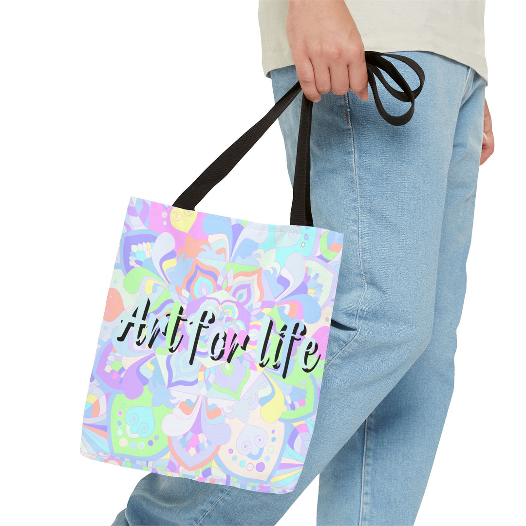 A colorful mandala tote bag with intricate design and Art for Life quote, perfect for carrying your essentials in style and showing off your artistic flair