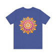A detailed and colorful mandala pattern adorning a vibrant t-shirt symbolizing peace and harmony