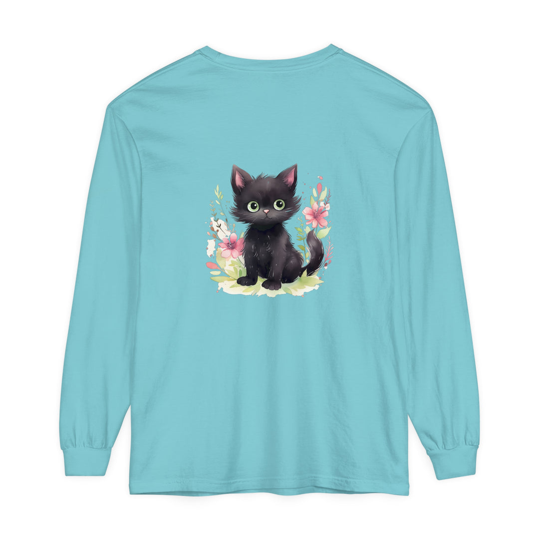 A charming and colorful watercolor T-shirt featuring a playful kitten surrounded by vibrant floral designs