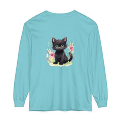 A charming and colorful watercolor T-shirt featuring a playful kitten surrounded by vibrant floral designs