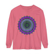 A close-up image of an intricate mandala design on a unisex long sleeve t-shirt in vibrant colors